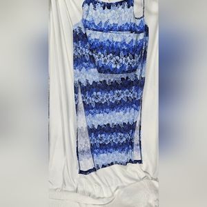 Sleevless top with tie and long skirt to match